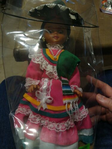 Mexico Tipicas Dolly Jalisco. In Plastic Container. 13 Inches Tall